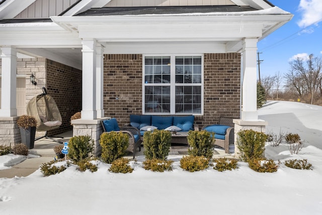 view of snow covered patio