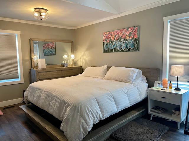 bedroom featuring ornamental molding, visible vents, baseboards, and dark wood-style floors