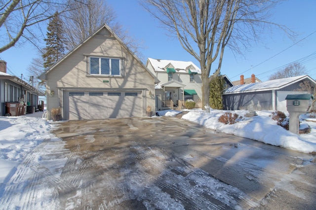 view of front of house featuring driveway and an attached garage