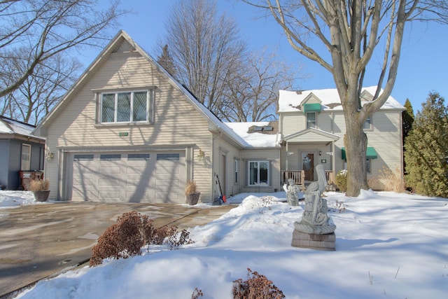 view of front of property with a garage and driveway