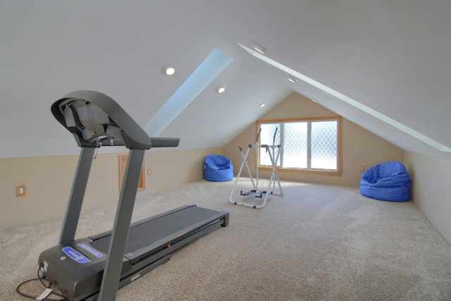 workout area featuring lofted ceiling, carpet, and recessed lighting