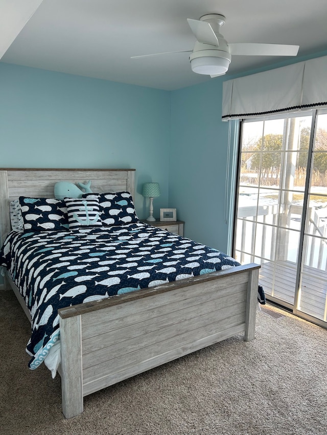 bedroom featuring a ceiling fan, access to outside, and carpet flooring