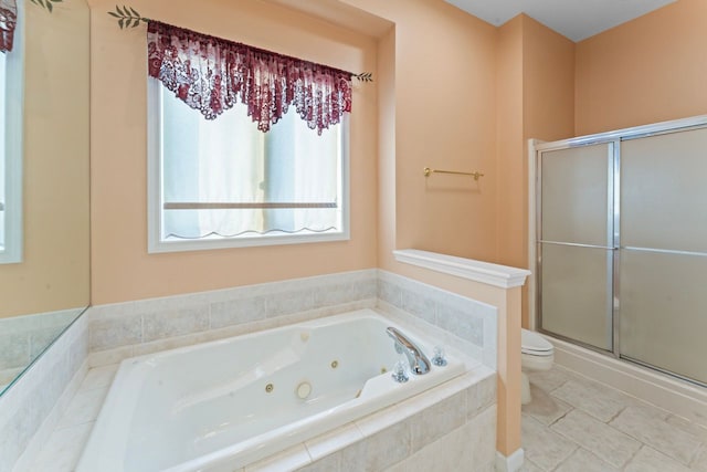 6440 Wailea Dr, Grand Blanc, MI 48439 - bathroom featuring a jetted tub, toilet, and a stall shower