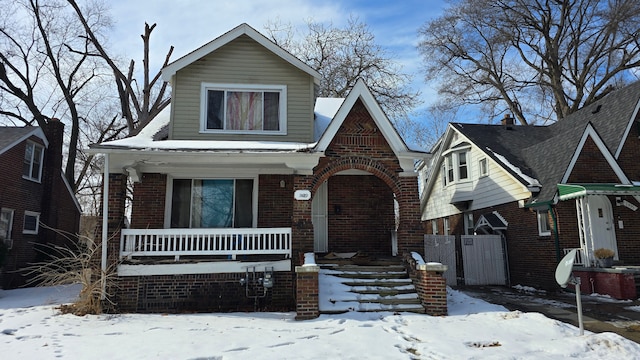 view of front facade featuring brick siding