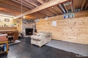 living area featuring a fireplace