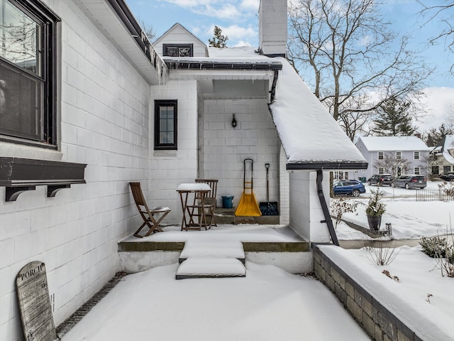 view of snow covered patio