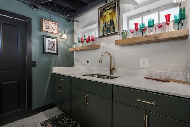 bar with wet bar and a sink