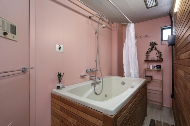 bathroom with shower / tub combo