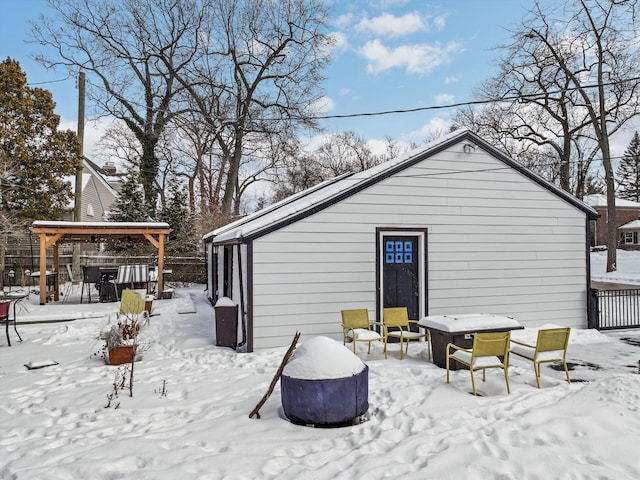 view of snow covered house