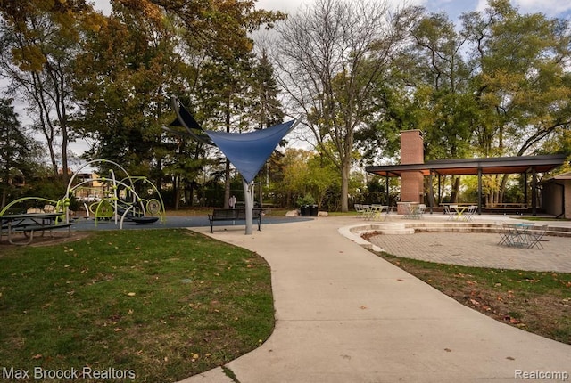 surrounding community with a gazebo and a lawn