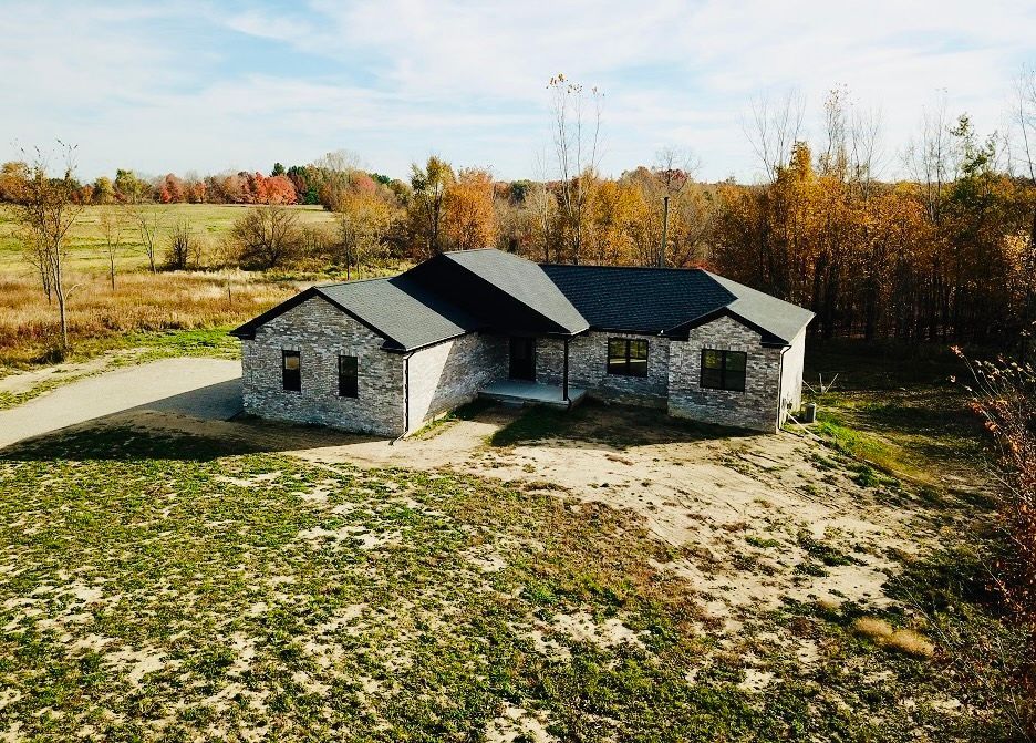 view of outbuilding with a rural view