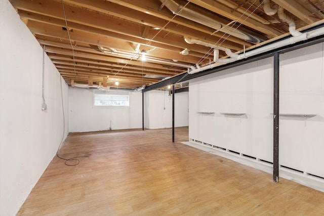 basement with wood finished floors