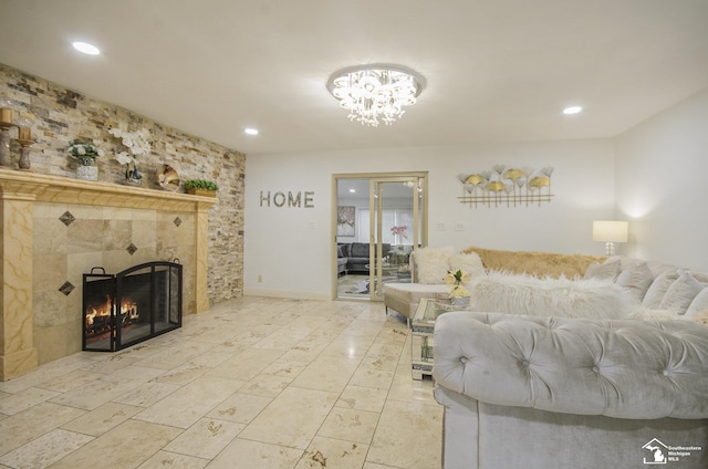 7740 Ternes St, Dearborn, MI 48126 - living room featuring recessed lighting, a fireplace, and baseboards