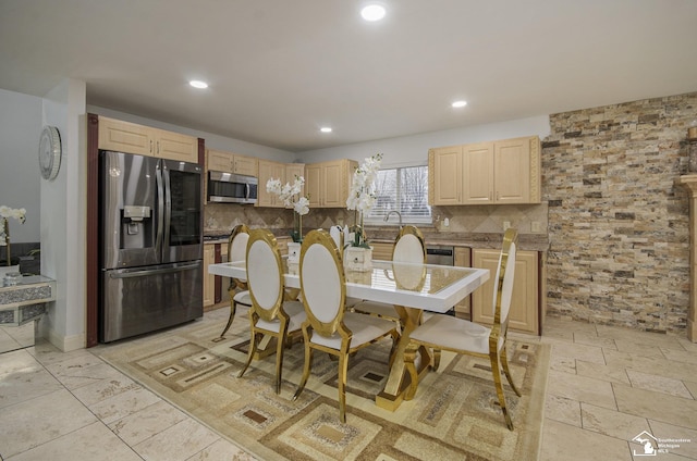 7740 Ternes St, Dearborn, MI 48126 - kitchen with stainless steel appliances, recessed lighting, light brown cabinets, and tasteful backsplash