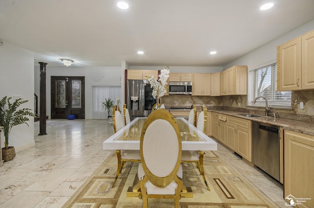 7740 Ternes St, Dearborn, MI 48126 - kitchen featuring light brown cabinets, appliances with stainless steel finishes, and a sink