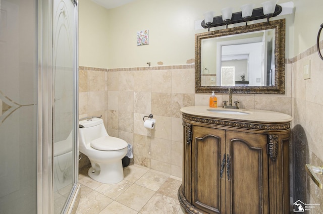 7740 Ternes St, Dearborn, MI 48126 - full bathroom with tile walls, toilet, a shower stall, vanity, and tile patterned floors