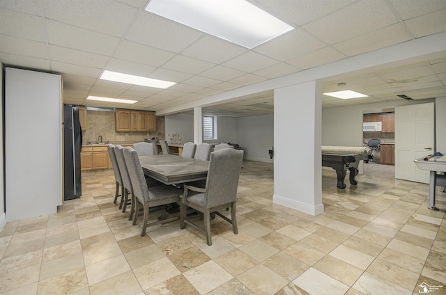 7740 Ternes St, Dearborn, MI 48126 - dining room with a drop ceiling and baseboards
