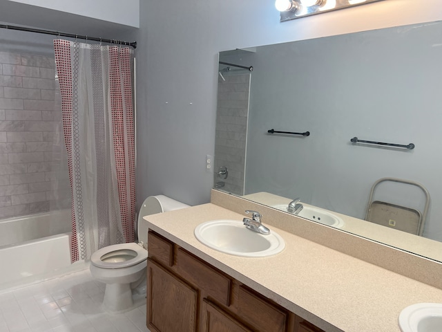 full bathroom with vanity, shower / bath combo with shower curtain, toilet, and tile patterned floors