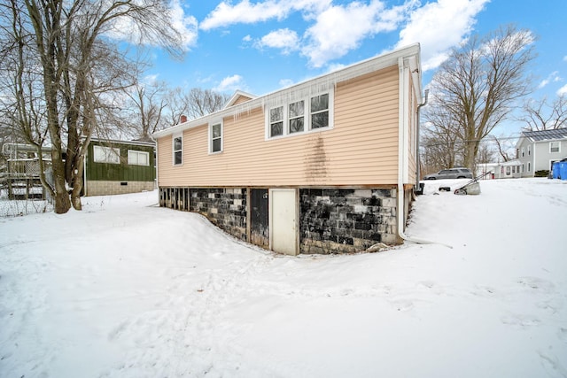 view of snow covered property