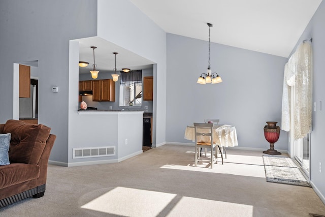 interior space with baseboards, an inviting chandelier, visible vents, and light colored carpet