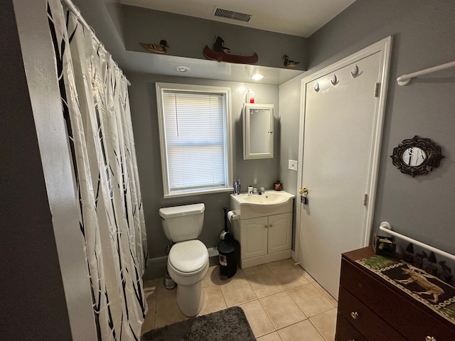 full bathroom with visible vents, vanity, toilet, and tile patterned floors