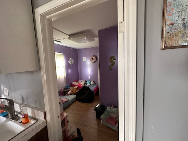 bedroom featuring wood finished floors