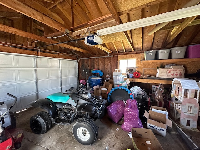 garage featuring a garage door opener