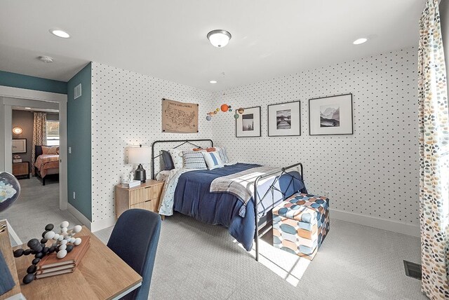 bedroom featuring recessed lighting, light carpet, visible vents, baseboards, and wallpapered walls