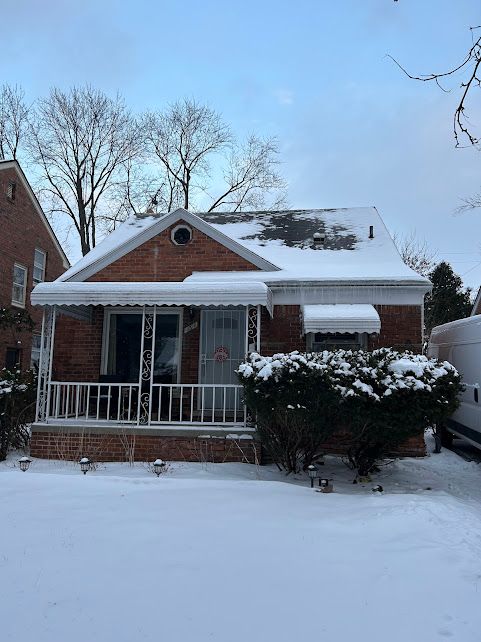 bungalow with brick siding