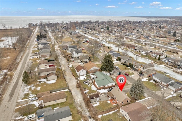 aerial view with a water view and a residential view