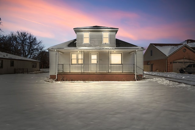 view of front of property featuring covered porch