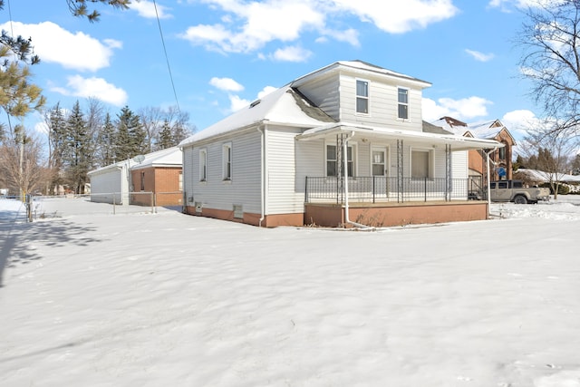 view of front of house featuring a porch and fence