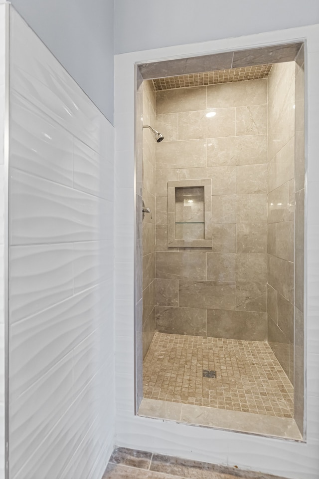 full bathroom with a shower stall