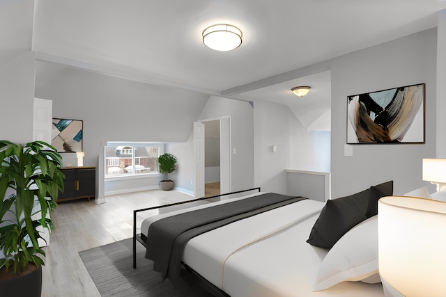 bedroom with lofted ceiling, light wood-style flooring, and baseboards