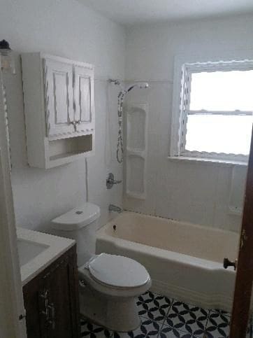 full bath featuring bathtub / shower combination, vanity, and toilet