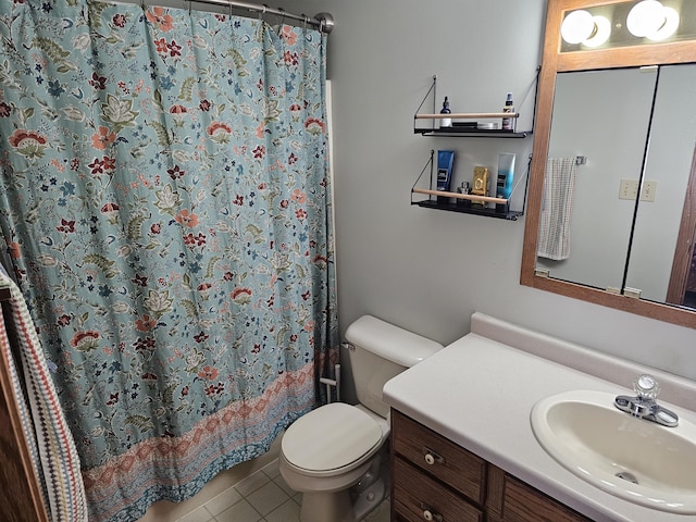 full bath with toilet, a shower with curtain, vanity, and tile patterned floors