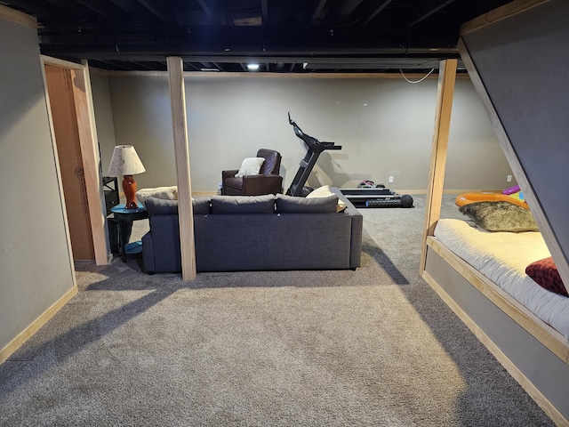 living room with carpet floors and baseboards