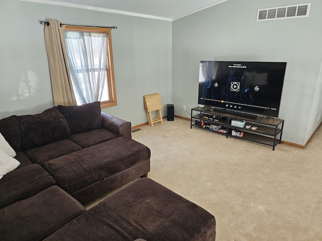 living area with baseboards, light colored carpet, visible vents, and crown molding