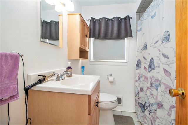 full bath with curtained shower, visible vents, toilet, vanity, and tile patterned flooring