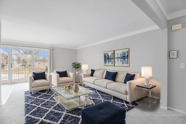 carpeted living room featuring crown molding and baseboards