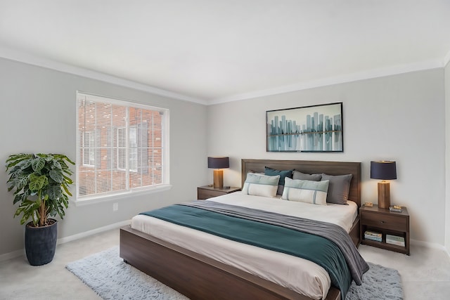 bedroom with crown molding, baseboards, and light carpet