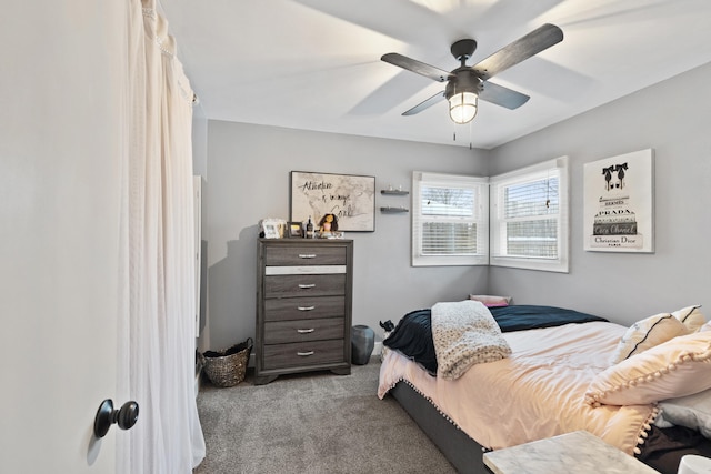 bedroom featuring light carpet and ceiling fan