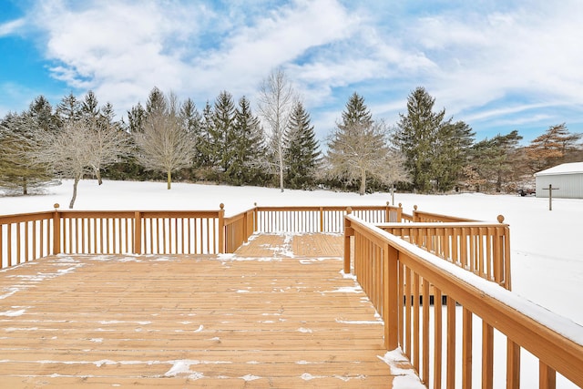 view of snow covered deck