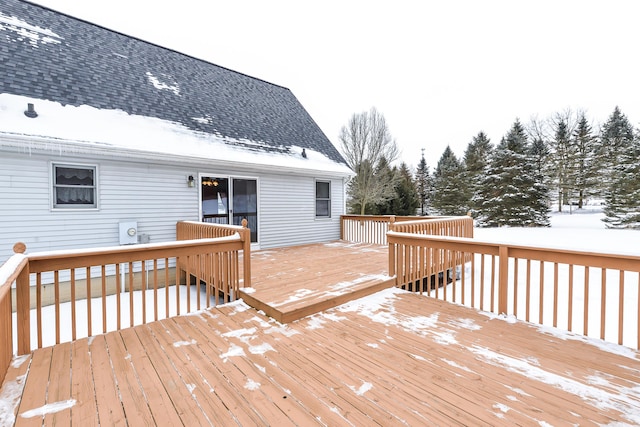 view of snow covered deck