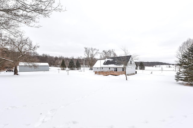 view of yard covered in snow