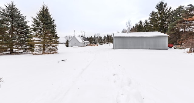 view of yard covered in snow