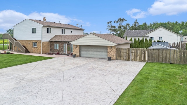 view of front of property featuring driveway, an attached garage, a front lawn, and brick siding