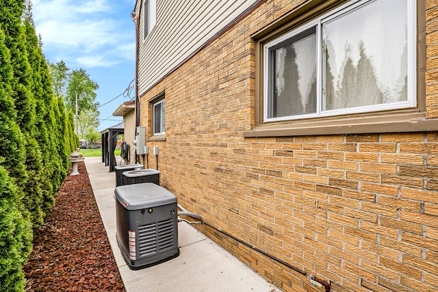 view of home's exterior featuring brick siding