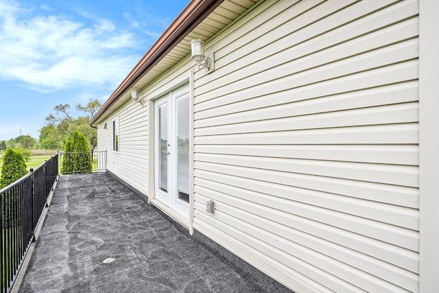 view of property exterior with a balcony