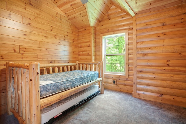 unfurnished bedroom featuring lofted ceiling, wood ceiling, and carpet